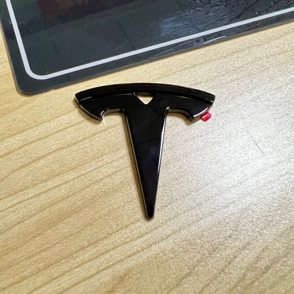 Steering Wheel Logo Cover with Black or Carbon-Pattern Finish & 3M Backing for Tesla Model 3 / Model Y