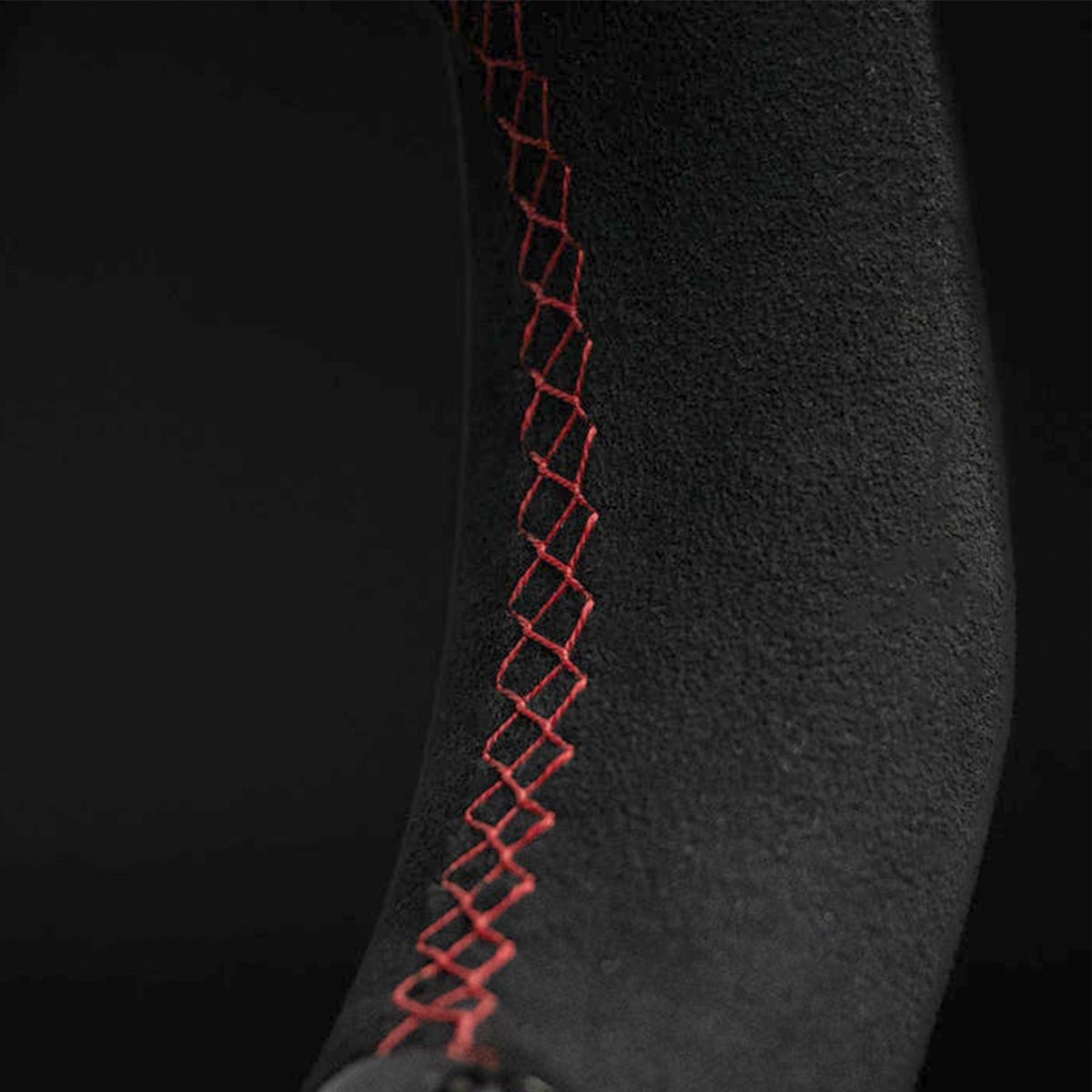 Suede-Like Grip with Red Stitching